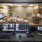 View inside a medical simulation room in Michigan College of Nursing