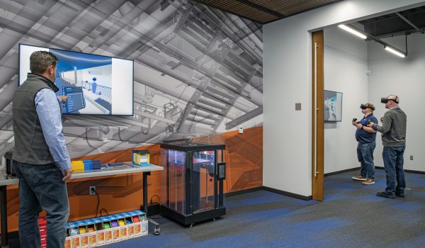 Employees using the MCL virtual reality room.