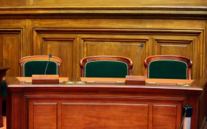 Bench inside a U.S. courtroom.