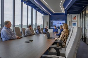 MCL Employees in Boardroom MCL employees meet in the boardroom.