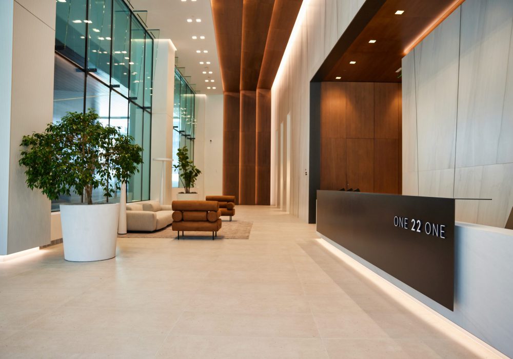 Interior shot of the lobby and front desk of ONE22ONE Broadway in Nashville