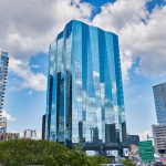Exterior daytime shot of ONE22ONE Broadway office tower in Nashville