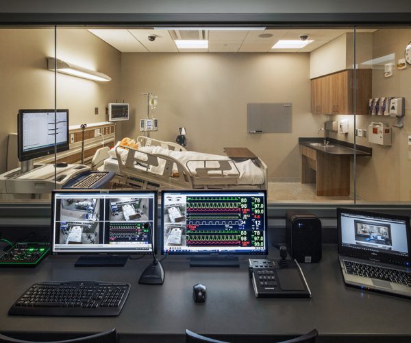 View inside a medical simulation room in Michigan College of Nursing